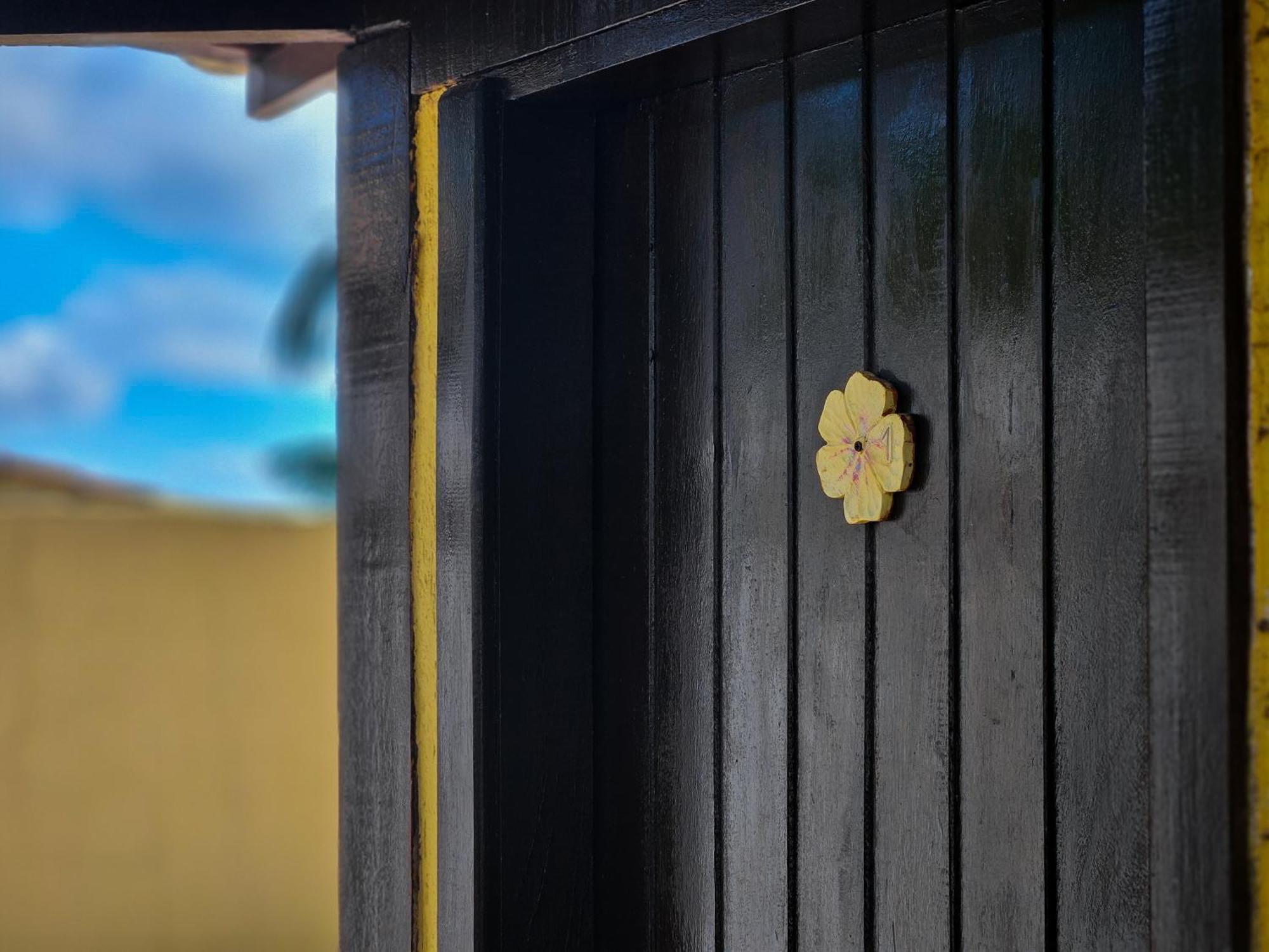 Bella Vista Ocean View Hotel Armacao dos Buzios ภายนอก รูปภาพ A golden flower-shaped knob on a door